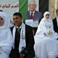 عباس يزف ٥٠٠ عروس وعريس في رام الله