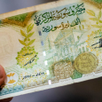 انهيار العملة: الليرة السورية تلحق بالليرة اللبنانية