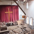 «داعش» تحرق محتويات كنيسة وترفع رايتها فوقها