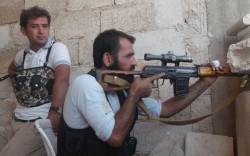 مقاتلون أكراد في تل حاصل