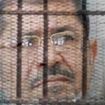 مرسي: «شرف عظيم أن أتخابر والإخوان مع حركة حماس»