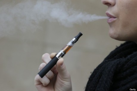 A person smokes an electronic cigarette on March 05, 2013 in Paris. AFP PHOTO / KENZO TRIBOUILLARD        (Photo credit should read KENZO TRIBOUILLARD/AFP/Getty Images)